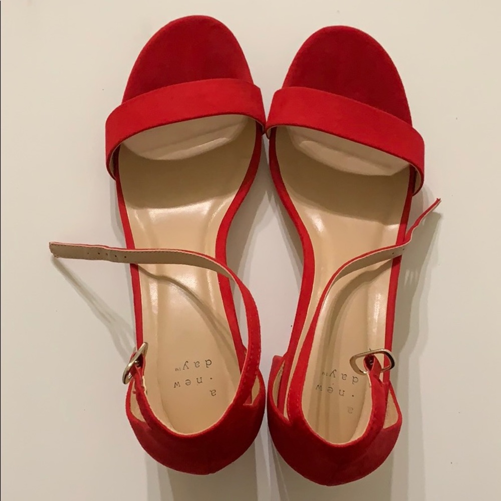 Bright red straps block heels